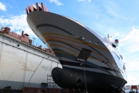 A Luxury Yacht, Two Cruise Ships and a Ferry Sail In for Repair