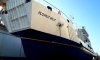 Docks Occupied by a Catamaran, a Yacht and a Repair Ship
